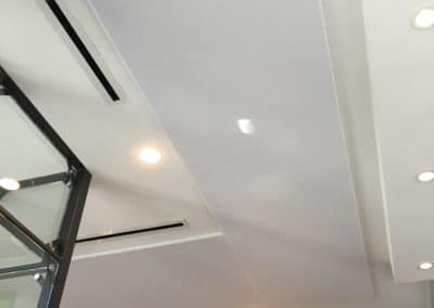 Ambli DTC Office Interior Ceiling Detail with white acoustic treatment stretched fabric