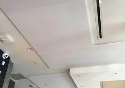 Ambli DTC Office Interior Ceiling Detail with white acoustic treatment stretched fabric
