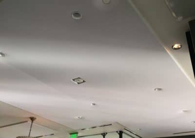 Ambli DTC Office Interior Ceiling Detail with white acoustic treatment stretched fabric
