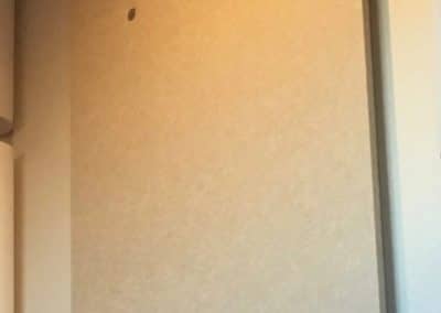 Acoustic treatment on stand offs on wall detail beige and white