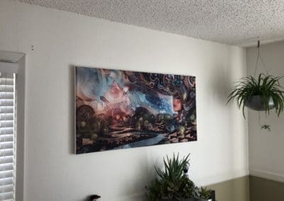 Sublimated artwork fabric acoustic treatment panel hung in Cervantes Masterpiece ballroom venue office