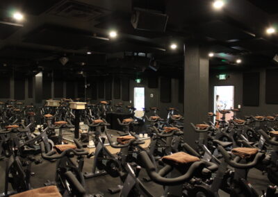 Ritual Spin Gym in Denver Colorado showing acoustic panels and custom audio system installed by Contour Audio